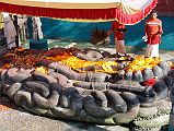 Kathmandu Valley 1 Budhanikantha 1 Hindu Priests Perform Ceremony At Budhanikantha Sleeping Vishnu Statue Hindu priests perform a ceremony around 9am at Budhanilkantha Narayan (Sleeping Vishnu), 15km north from Thamel in Kathmandu. The 5m long great stone figure of the Hindu god Vishnu reclines on the coils of the cosmic serpent Ananta, lying in a 13m long tank.